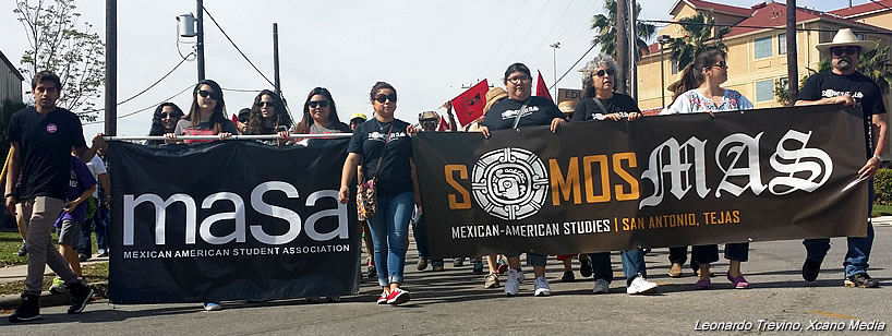 SOMOS Mas student organization marching in San Antonio, TX