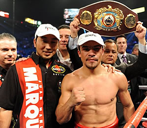 Juan Manuel Márquez boxing team show off championship belt after victory over Manny Pacquiao