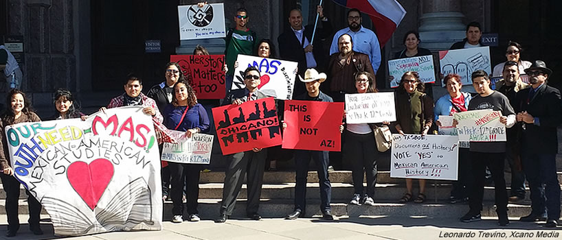 Coalition of Chicano activists join for photo on steps of Texas State Capitol