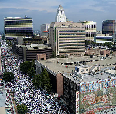 A staggering mass assembly of Latinos and others surround the building of downtown Los Angeles during La Gran Marcha in 2006
