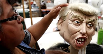Mexican factory worker inspects Donald Trump mask