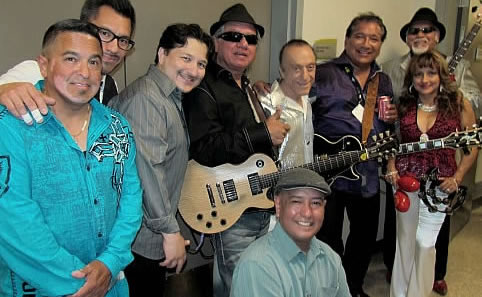 El Chicano group members with legendary DJ Art Laboe