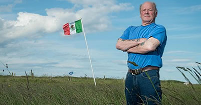 A Mexican flag is raised in protest near Trump’s golf course In Scotland