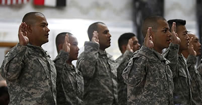 Mexican American soldiers seen taking oath of loyalty and allegiance to U.S. in Iraq